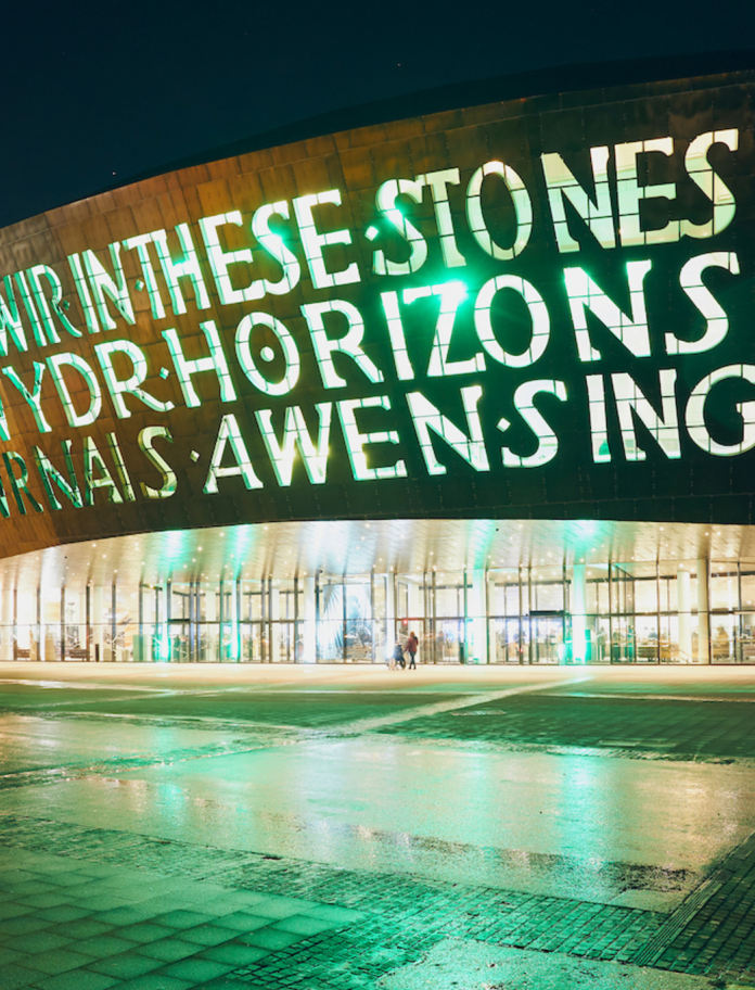 Exterior of Wales Millennium Centre at night.