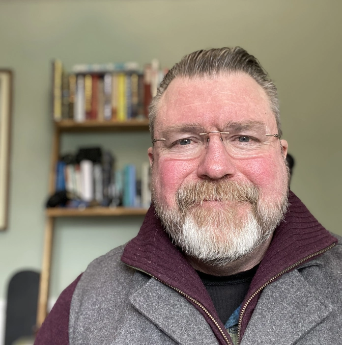 bio image of Professor Paul Mullins