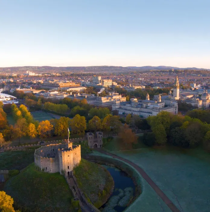 aerial shot of cardiff castle keep on mount and the greenland surrounding it 