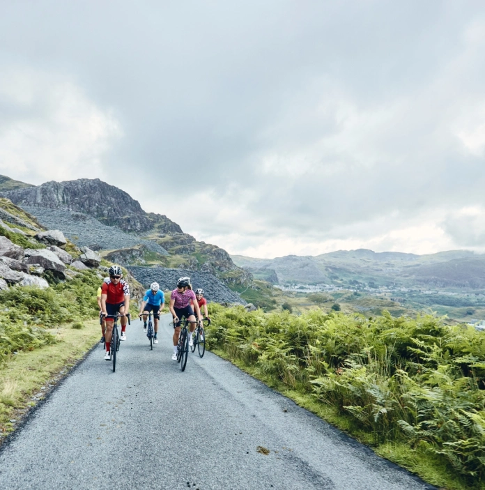 group of people cycling in Wales