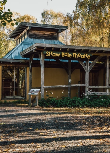 A theatre at an eco centre surrounded by forestry.`