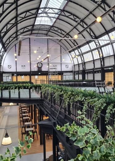 A refurbished Victorian indoor market taken from the first floor balcony.