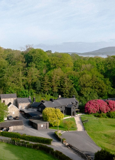 Ynyshir restaurant with rooms black building exterior set in green countryside