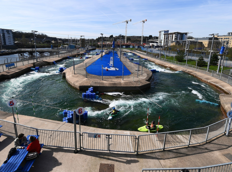 A canoe in the water at a white water rafting centre.