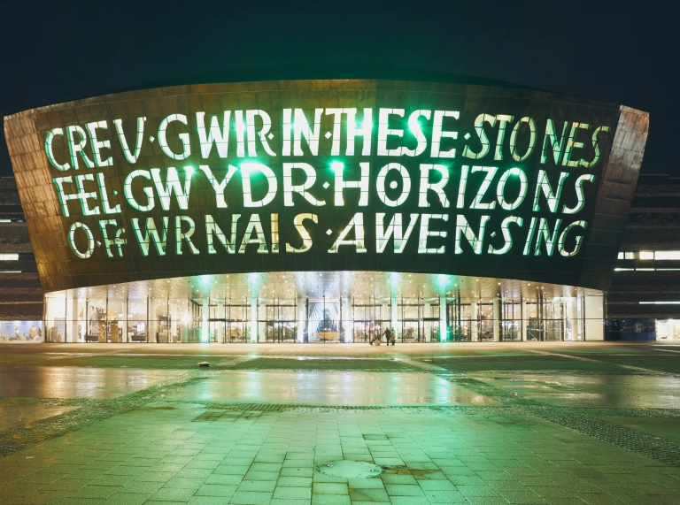 Exterior of the Wales Millennium Centre at night.