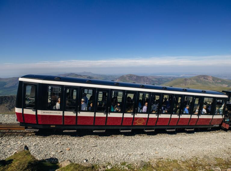 Train arriving at the top of a mountain.