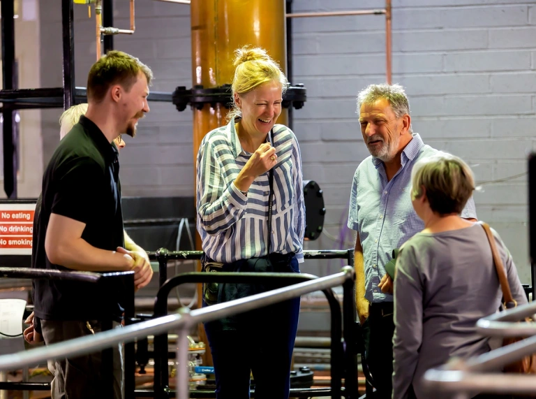 A group touring a distillery.