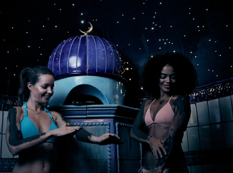 Two people in a spa.