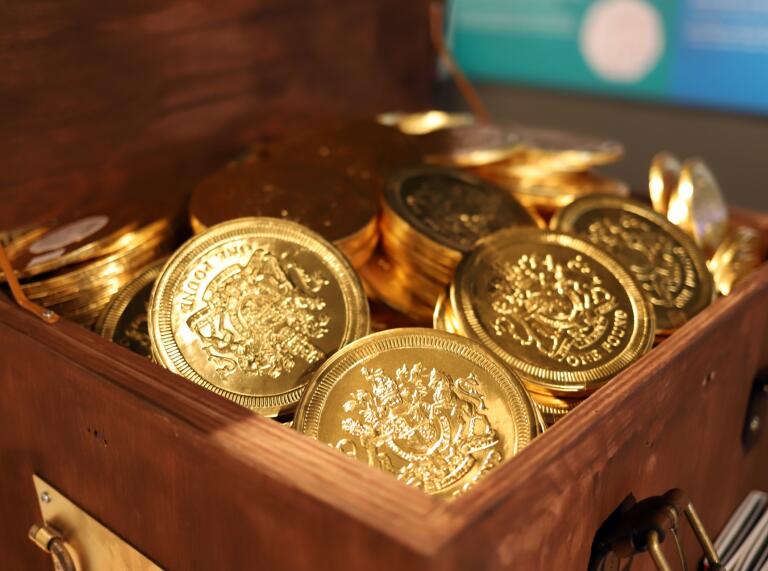 Treasure box full of coins at The Royal Mint Experience