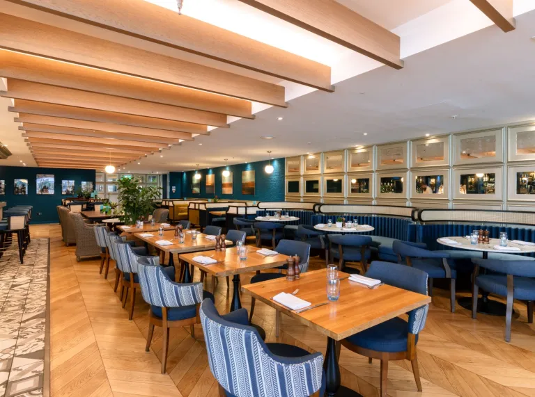 chairs and tables set up in the Tir a Mor restaurant