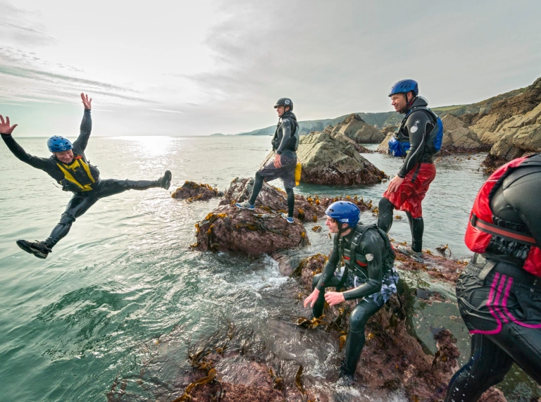 Coasteering in West Wales off clifs