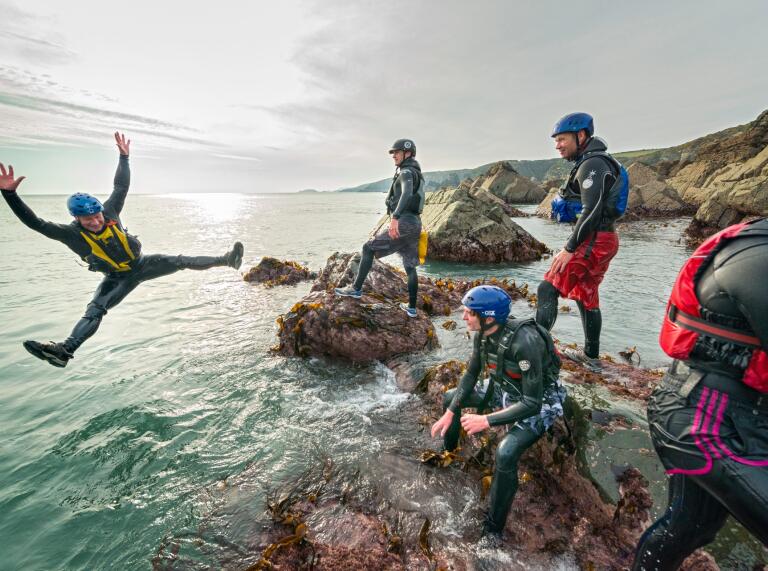 Coasteering in West Wales off clifs 