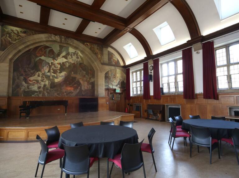 Conference facilities in a grand hall at a university.