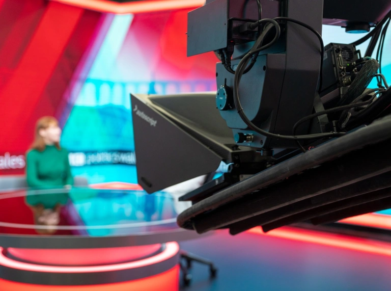 camera facing presenter in BBC Cymru Wales studio