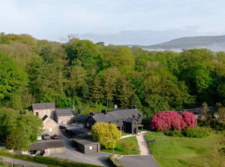 Ynyshir restaurant with rooms black building exterior set in green countryside