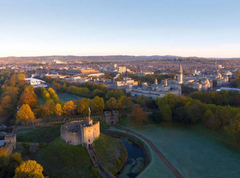 aerial shot of cardiff castle keep on mount and the greenland surrounding it 