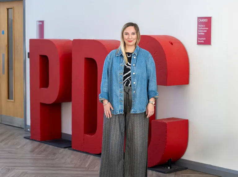 bio image of Sofia Christidi sitting at her lworkplace