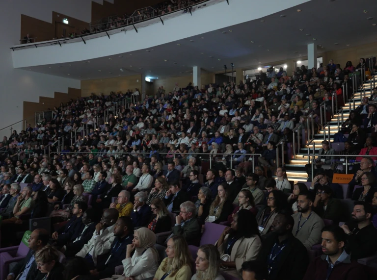 Attendees sitting inpkenary sessions at ICC Wales 