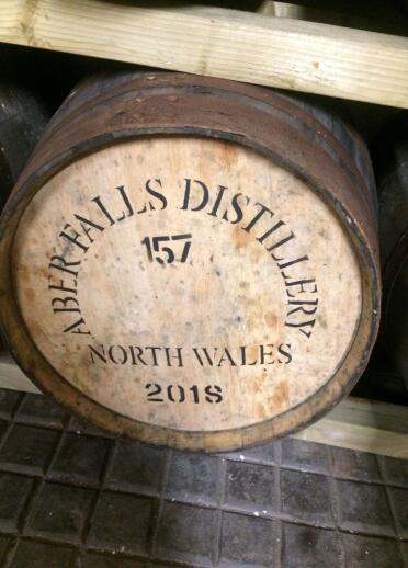 A barrel with Aber Falls Distillery North Wales 2018 stamped on it.