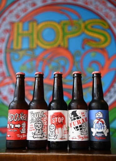 Five bottles of a range of craft beer.