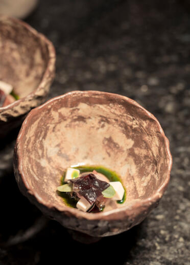 Image of food in two small brown bowls
