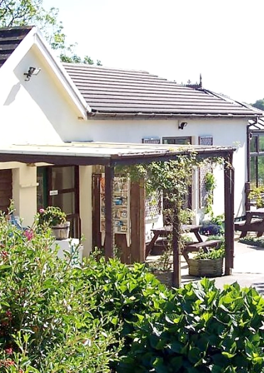 The restaurant and outside seating area at a vineyard.
