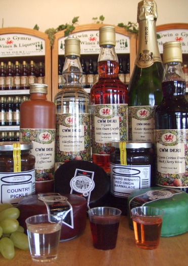 Bottles of wine, chutneys and cheese on display in Cwm Deri Vineyard, Narberth.