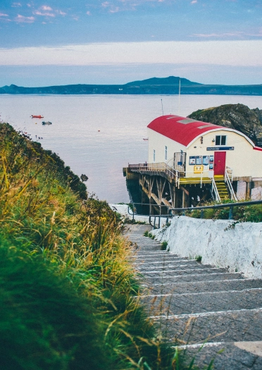 Image of steps leading down to the old lifeboat station and the sea