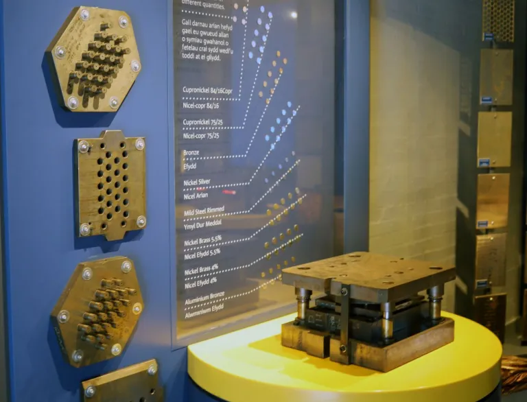 A press to make coins displayed at The Royal Mint Experience.