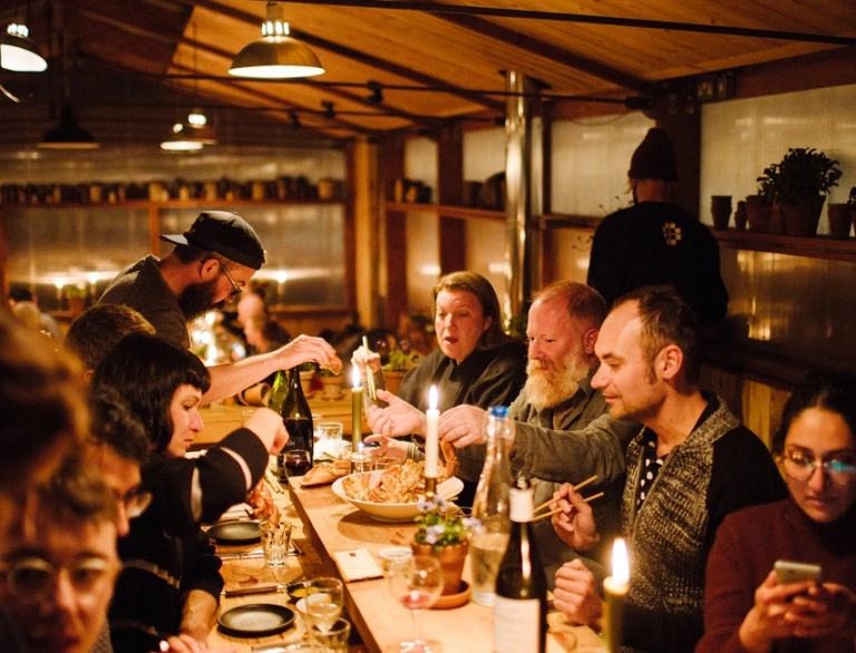 People dining around a table.