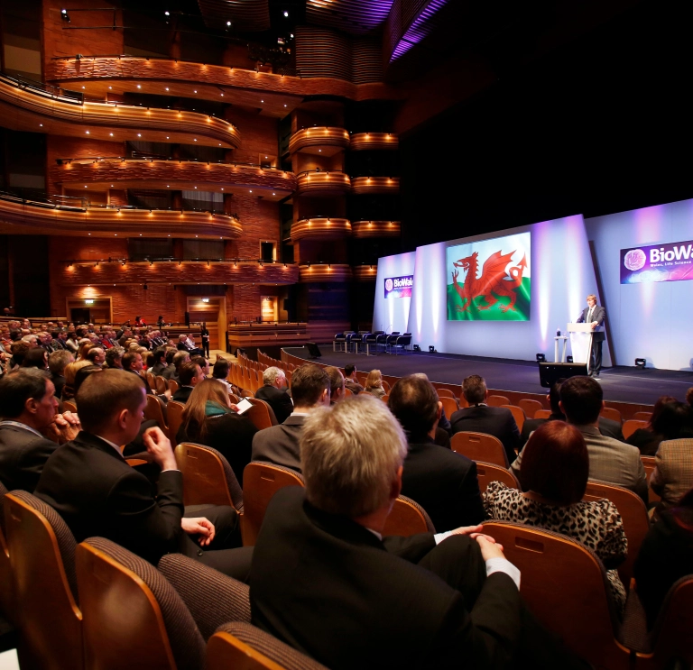 A conference being held in an entertainment theatre.