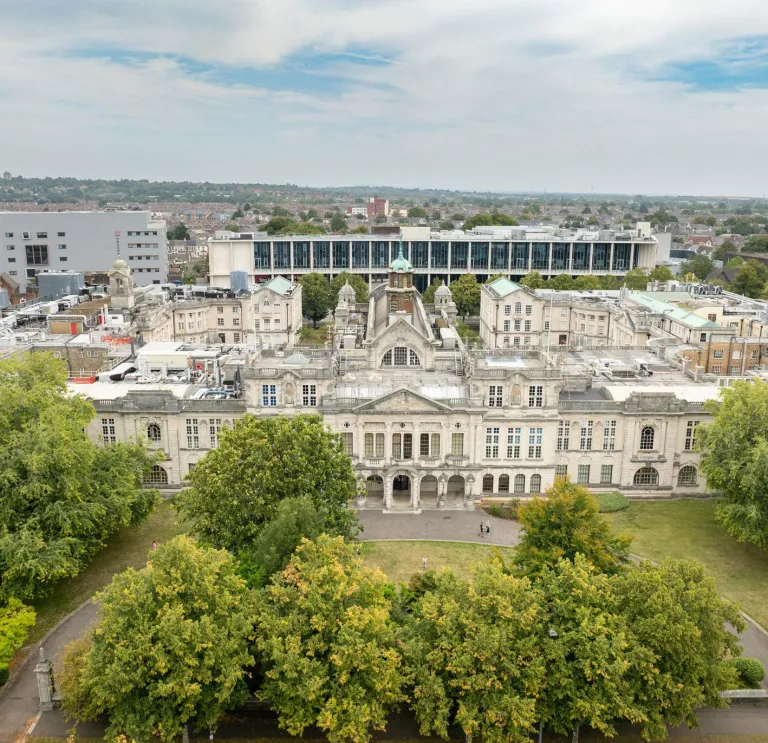 aerial image of Cardiff University in Cathays Park with trees lining the street  