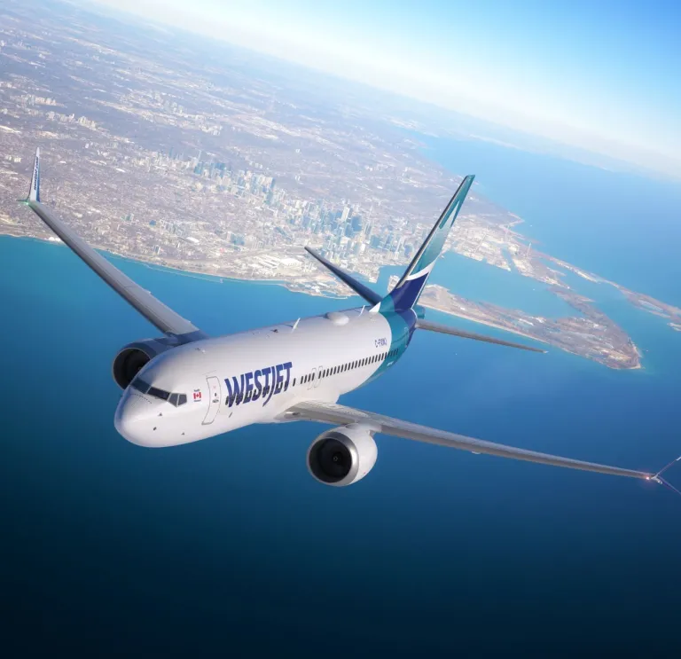 An aircraft in the sky above the sea