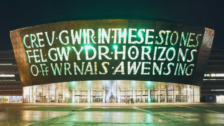 Exterior of the Wales Millennium Centre at night.