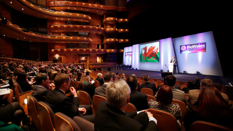 A conference being held in an entertainment theatre.