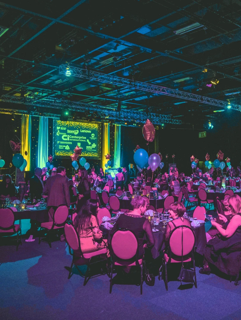 People enjoying a gala dinner evening inside the Venue Cymru.