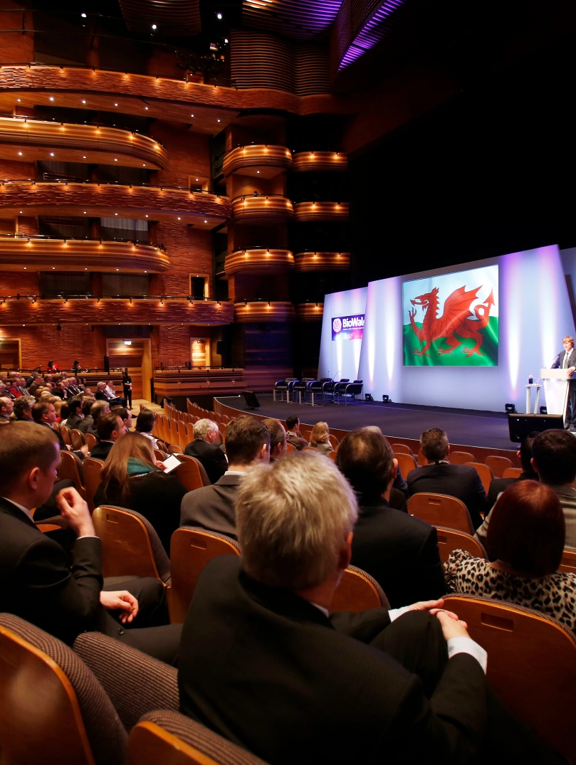 A conference being held in an entertainment theatre.