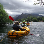 People pack rafting with Adventure Tours UK.