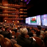 A conference being held in an entertainment theatre.