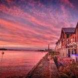 sunset at Quay Hotel and Spa with estuary and mountains at the side of the hotel 