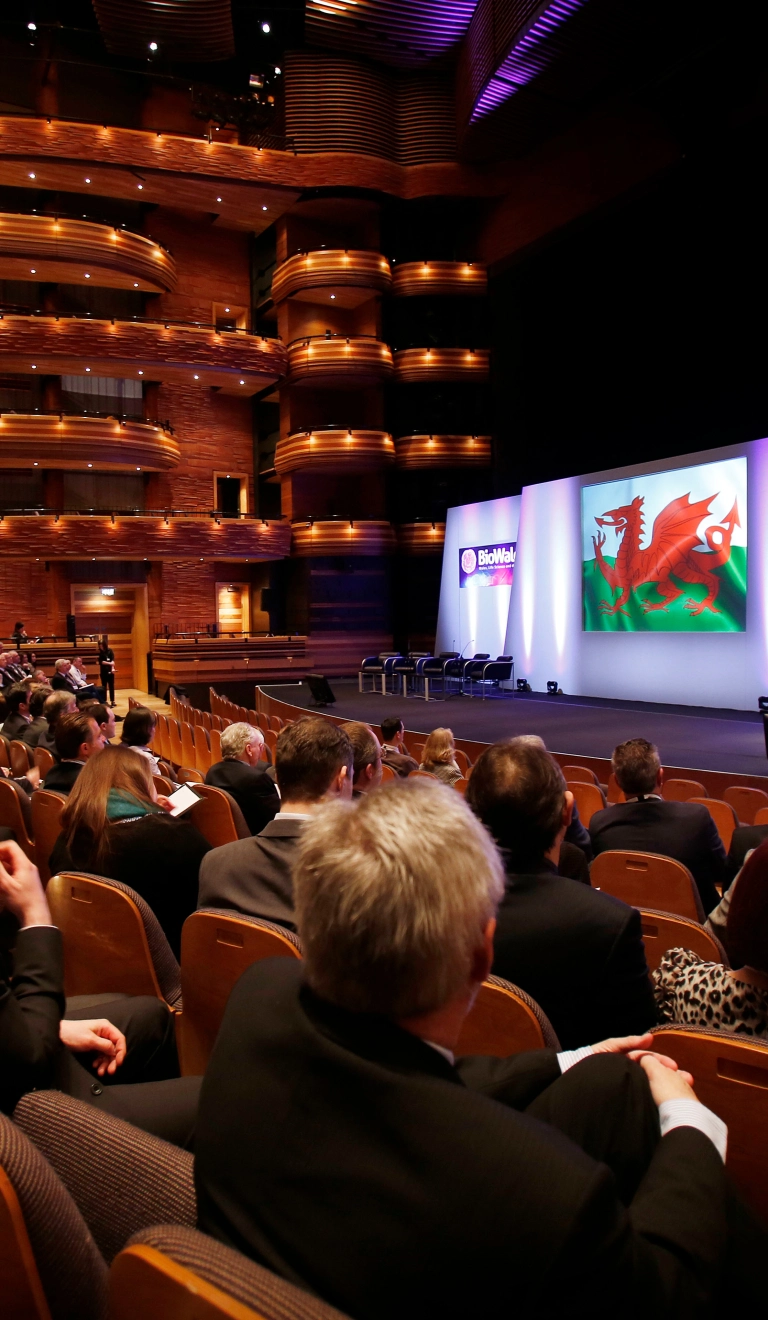 A conference being held in an entertainment theatre.
